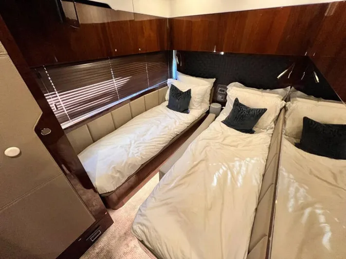 Blind Date Yacht Photos Pics Luxurious cabin interior of 2020 Fairline Squadron 68 yacht with twin beds.
