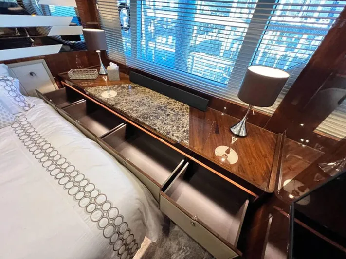 Blind Date Yacht Photos Pics Luxurious interior of 2020 Fairline Squadron 68 yacht with elegant wood finish and modern decor.