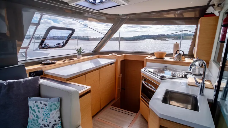 Muse Yacht Photos Pics Interior of 2019 Nautitech 40 Open with modern kitchen.