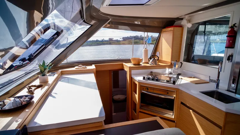 Muse Yacht Photos Pics Interior of 2019 Nautitech 40 Open with modern kitchen.