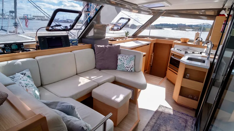 Muse Yacht Photos Pics Interior of 2019 Nautitech 40 Open with modern kitchen and lounge.