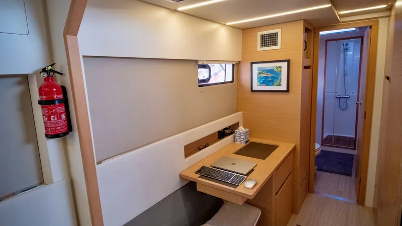 Muse Yacht Photos Pics Interior of 2019 Nautitech 40 Open with desk and bathroom.