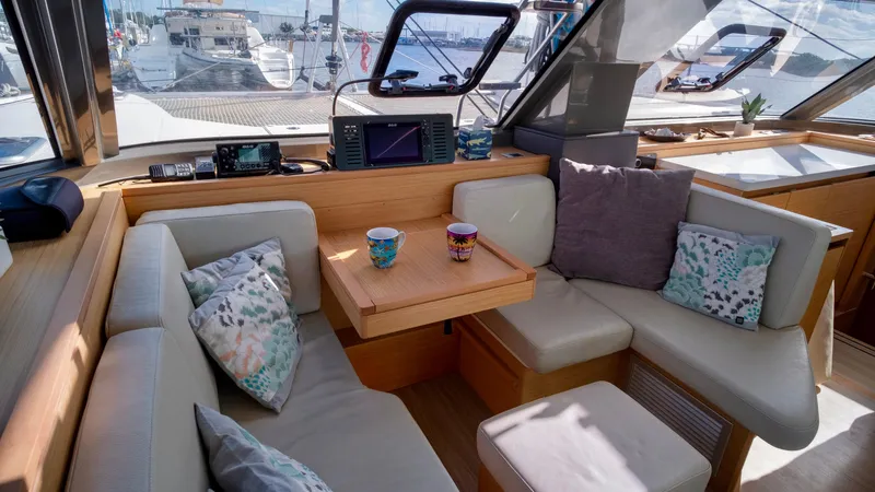 Muse Yacht Photos Pics Interior of a 2019 Nautitech 40 Open yacht with cozy seating area.