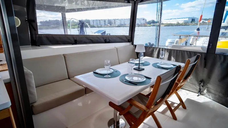 Muse Yacht Photos Pics Interior of 2019 Nautitech 40 Open with dining table.