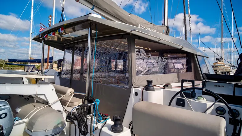 Muse Yacht Photos Pics Nautitech 40 Open 2019 catamaran docked under clear skies.