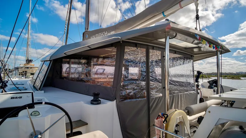 Muse Yacht Photos Pics Nautitech 40 Open 2019 catamaran with enclosed cabin and sails.