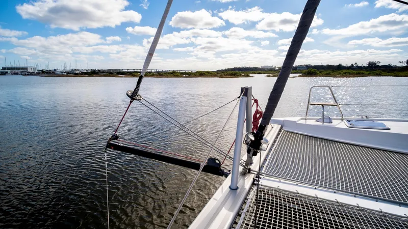Muse Yacht Photos Pics Nautitech 40 Open 2019 on calm water with blue sky.