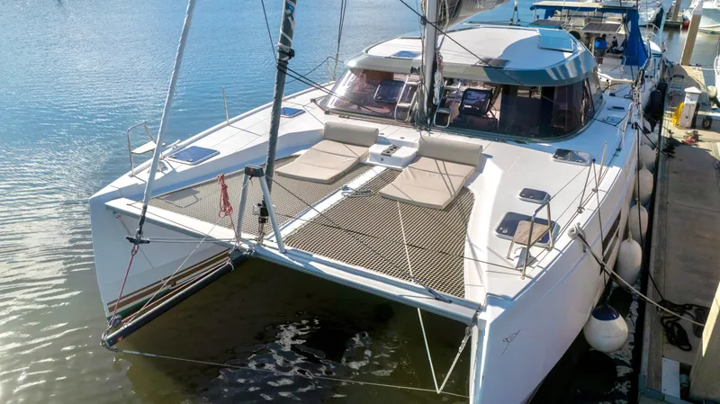 Muse Yacht Photos Pics Nautitech 40 Open 2019 catamaran docked on a sunny day.