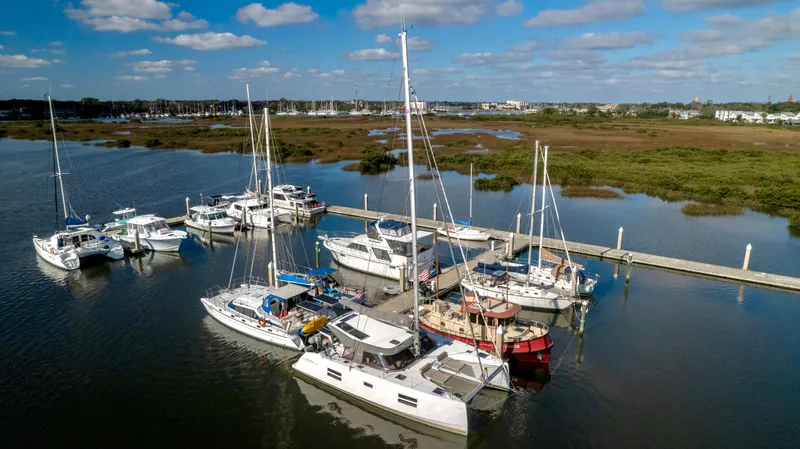 Muse Yacht Photos Pics Nautitech 40 Open 2019 in a scenic harbor.