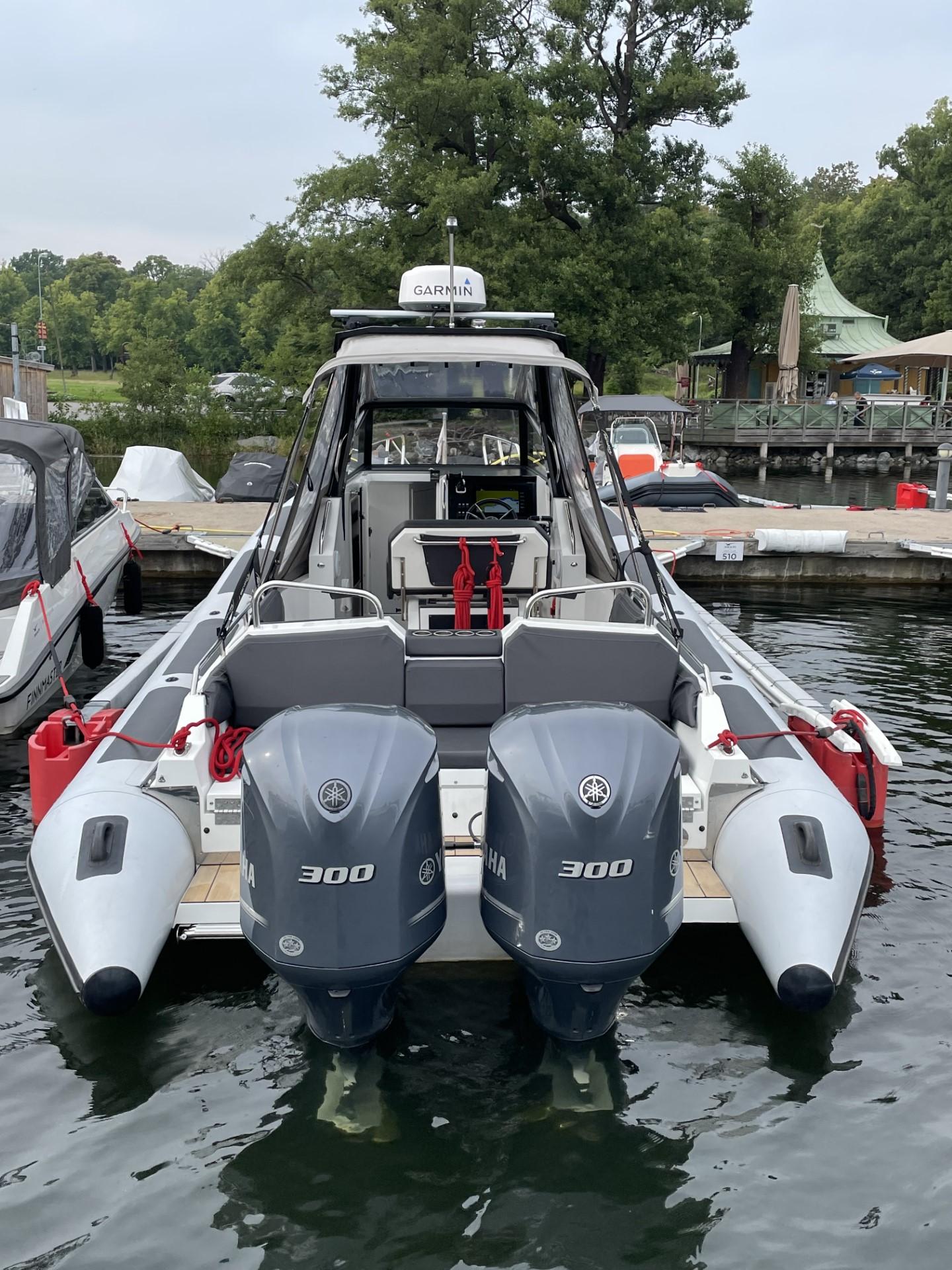 Agapi 950 boat, 2019 model, docked with dual 300 horsepower engines.