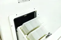 2023 Aquila 28 Molokai boat compartment with open storage hatch.
