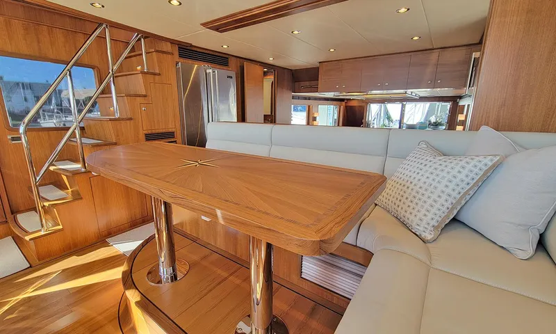 Our Way III Yacht Photos Pics Luxurious interior of 2023 Outer Reef Yachts 720 Motoryacht with elegant wood finishes.