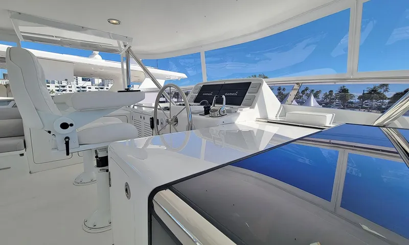 Our Way III Yacht Photos Pics 2023 Outer Reef Yachts 720 Motoryacht helm with modern controls and panoramic views.