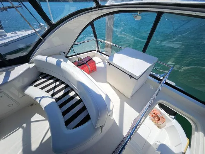  Yacht Photos Pics 2007 Meridian 411 Sedan interior with curved seating and ocean view.