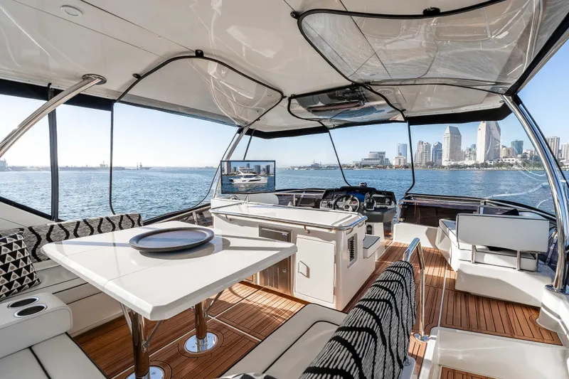 Catatude Yacht Photos Pics Luxurious interior of 2016 Aquila 44 Power Cat with city skyline view.