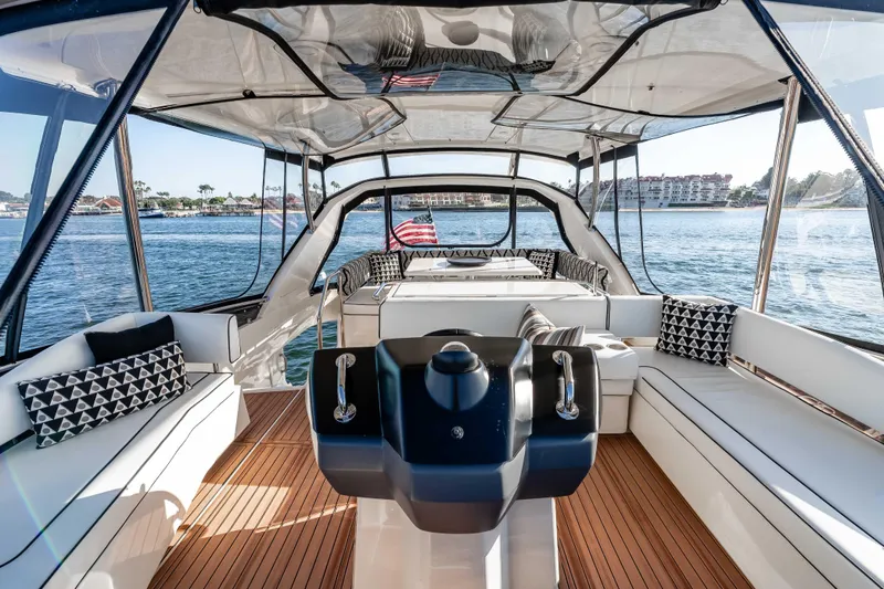 Catatude Yacht Photos Pics Luxurious 2016 Aquila 44 Power Cat interior with elegant seating and scenic water view.