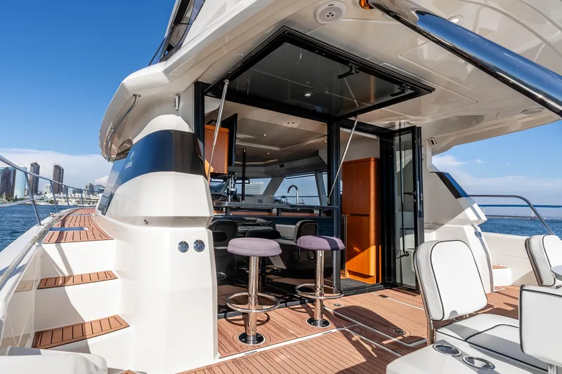 Catatude Yacht Photos Pics Luxurious 2016 Aquila 44 Power Cat yacht with modern interior and scenic ocean view.