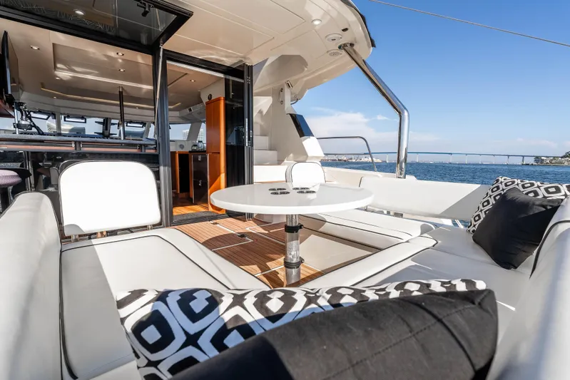 Catatude Yacht Photos Pics Luxurious 2016 Aquila 44 Power Cat interior with elegant seating and ocean view.