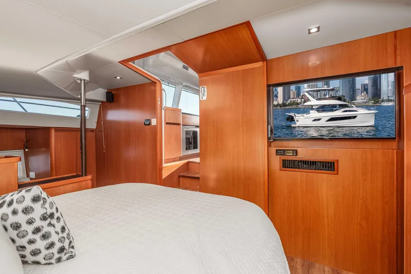 Catatude Yacht Photos Pics Interior of 2016 Aquila 44 Power Cat with wood finish and modern amenities.