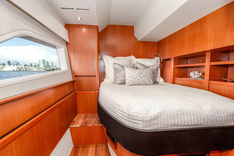 Catatude Yacht Photos Pics Luxurious cabin interior of 2016 Aquila 44 Power Cat with scenic window view.