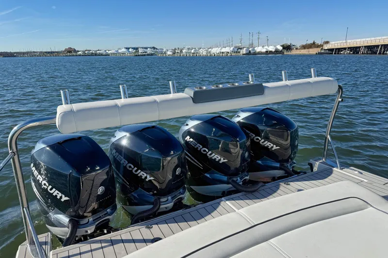  Yacht Photos Pics 2020 Formula 400 Super Sport Crossover with four Mercury outboard engines on water.