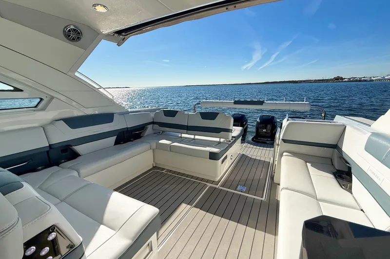  Yacht Photos Pics Luxurious 2020 Formula 400 Super Sport Crossover yacht interior with spacious seating and ocean view.