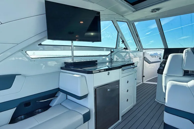  Yacht Photos Pics Interior of 2020 Formula 400 Super Sport Crossover yacht with modern seating and entertainment system.
