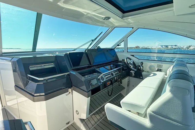  Yacht Photos Pics 2020 Formula 400 Super Sport Crossover yacht interior with modern helm and seating.