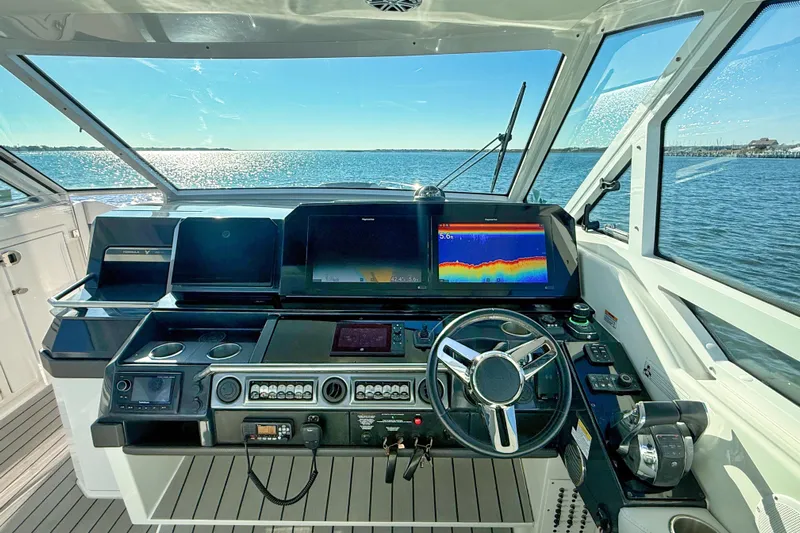  Yacht Photos Pics 2020 Formula 400 Super Sport Crossover helm with advanced navigation displays.