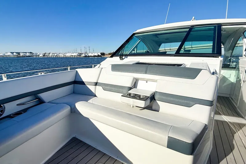  Yacht Photos Pics 2020 Formula 400 Super Sport Crossover yacht interior with seating, on a sunny day.