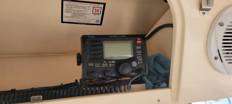 Fishin' Feinz Yacht Photos Pics VHF radio on 2008 Grady-White 330 Express boat dashboard.