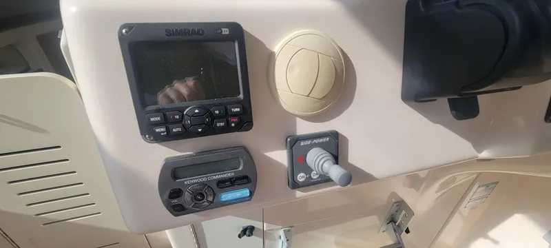 Fishin' Feinz Yacht Photos Pics Control panel of 2008 Grady-White 330 Express boat with navigation equipment.