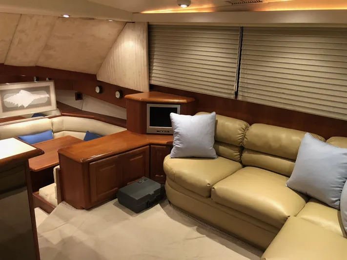 Pigal Yacht Photos Pics Luxurious interior of a 1990 Viking 38 Convertible yacht with beige leather seating.