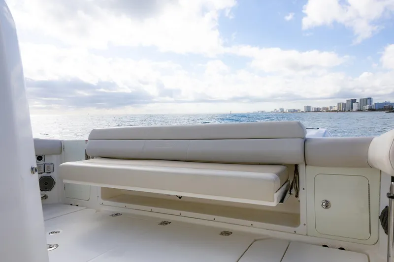  Yacht Photos Pics 2017 Boston Whaler 420 Outrage boat interior with ocean view and seating.