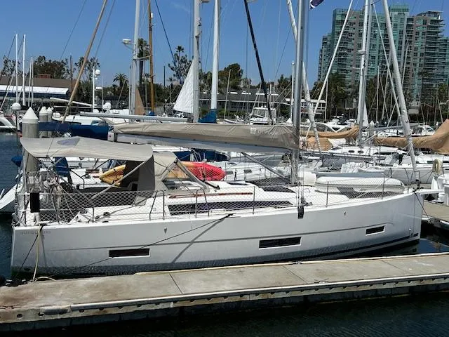 Gem Yacht Photos Pics 2022 Dufour 390 sailboat docked at marina.
