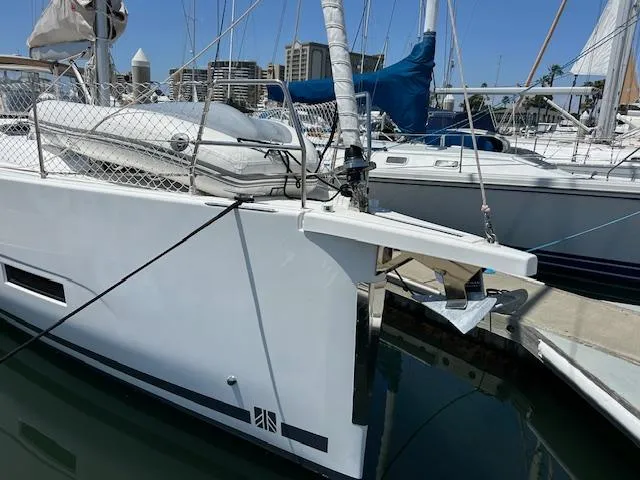 Gem Yacht Photos Pics 2022 Dufour 390 sailboat docked at a marina.