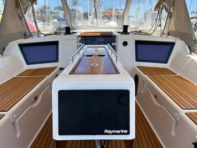 Gem Yacht Photos Pics 2022 Dufour 390 yacht cockpit with Raymarine navigation system and teak seating.