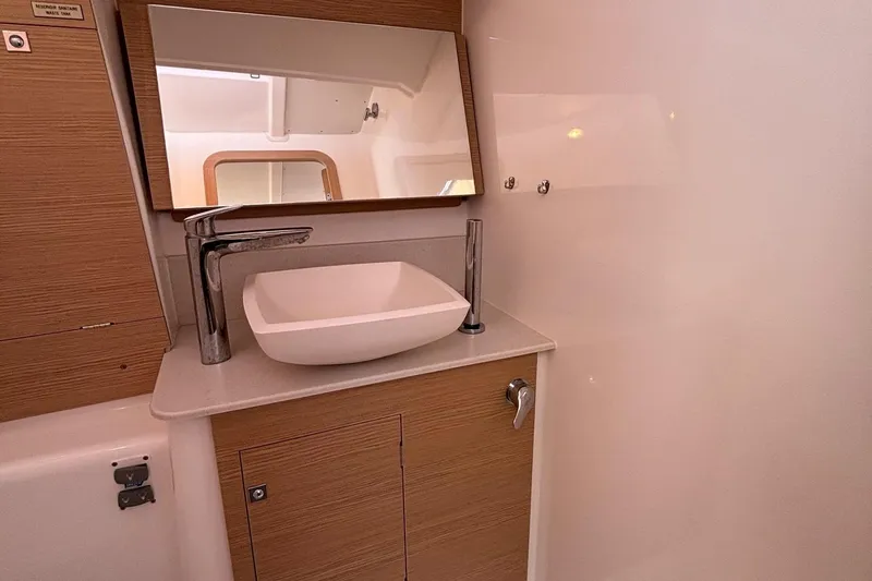 Gem Yacht Photos Pics Modern bathroom vanity in 2022 Dufour 390 yacht with sink and mirror.