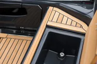 2023 Tofinou 9.7 yacht deck with sleek wood finish and storage compartment.