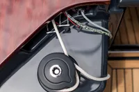 Close-up of Tofinou 9.7 yacht deck details, featuring sleek wood and rope elements, 2023 model.