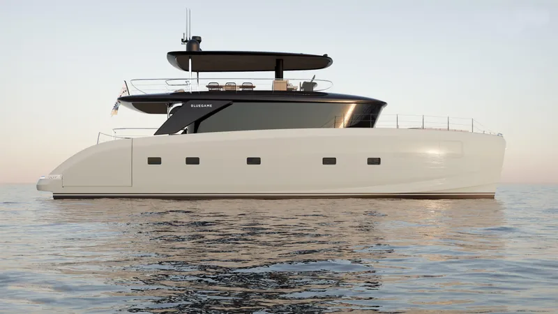 Bgm75/05 Yacht Photos Pics 2025 Bluegame BGM75 yacht on calm water at sunset.