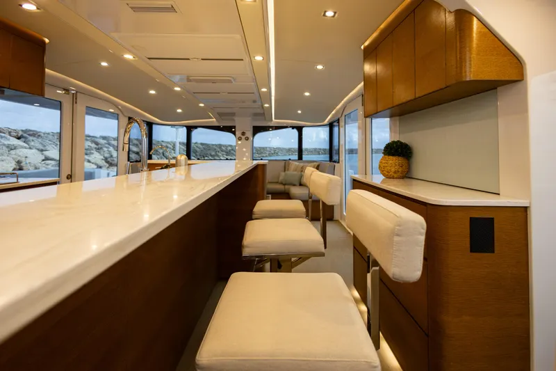  Yacht Photos Pics Luxurious interior of 2018 Tag 60 yacht with elegant seating and modern design.