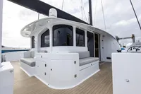 Luxurious 2018 Tag 60 yacht with sleek design and spacious seating area.