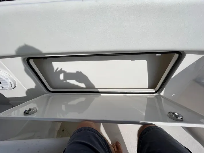  Yacht Photos Pics Open storage compartment on 2020 Jupiter 34 Center Console boat.