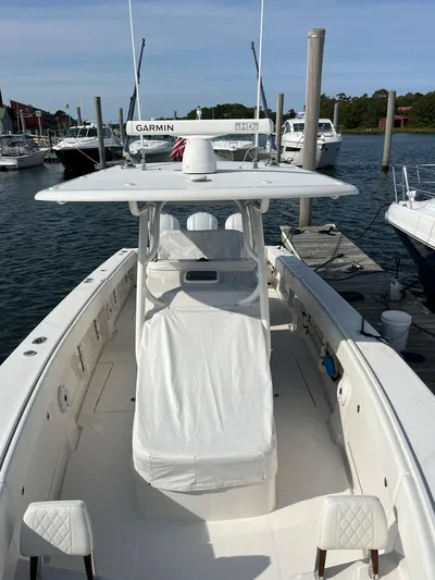  Yacht Photos Pics 2020 Jupiter 34 Center Console boat docked at marina, featuring Garmin equipment.