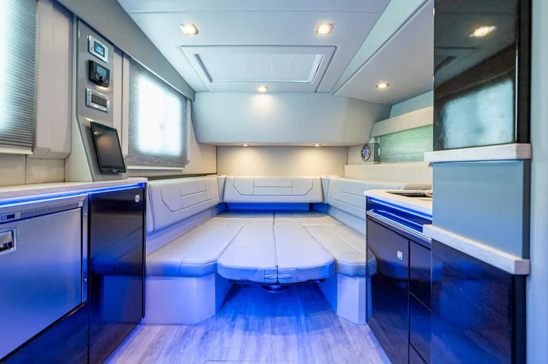  Yacht Photos Pics Luxurious interior of 2019 Formula 430 Super Sport Crossover with modern seating and ambient lighting.