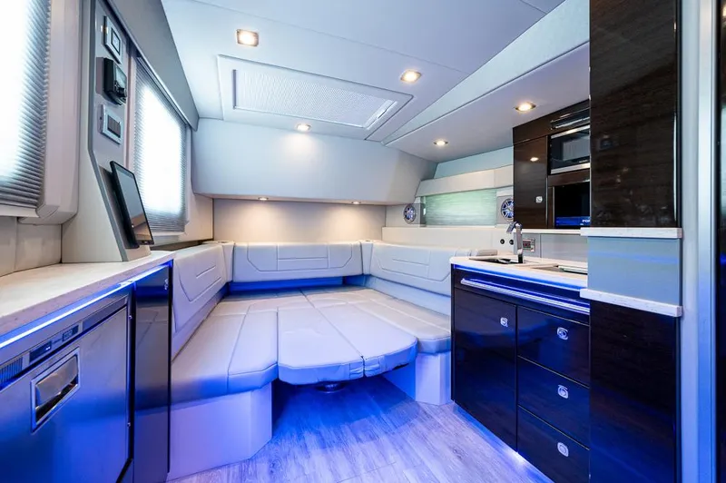  Yacht Photos Pics Luxurious interior of 2019 Formula 430 Super Sport Crossover with modern seating and ambient lighting.