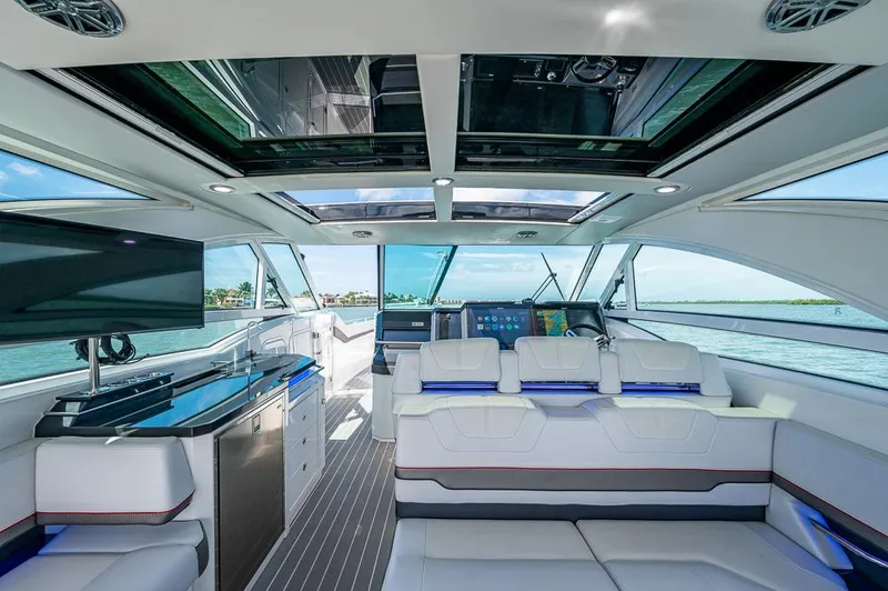  Yacht Photos Pics Luxurious interior of 2019 Formula 430 Super Sport Crossover yacht with modern seating and panoramic views.