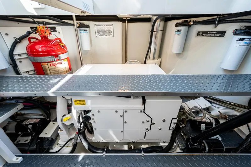  Yacht Photos Pics Engine compartment of a 2019 Formula 430 Super Sport Crossover with fire extinguisher and filters.