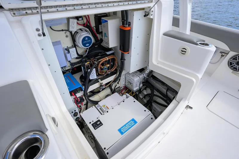  Yacht Photos Pics 2024 Regulator 37 boat engine compartment with advanced electrical systems and components.